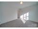 Bedroom featuring carpet and bright light at 0000 Trull Hinson Rd # 1, Wingate, NC 28174