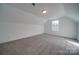 A bright, empty room with plush carpeting and natural light from window at 0000 Trull Hinson Rd # 1, Wingate, NC 28174