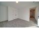 Bedroom featuring carpeted floors, a double door closet, and a window at 0000 Trull Hinson Rd # 1, Wingate, NC 28174