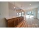 Kitchen bar with quartz countertops, wood cabinets, and pendant lighting at 0000 Trull Hinson Rd # 1, Wingate, NC 28174