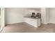 Spacious kitchen area, perfect for entertaining and featuring a seamless transition to the living area at 102 Lightning Dr, Shelby, NC 28152