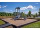 Community playground with slides and climbing structures, perfect for Gathering fun and outdoor activities at 108 Lightning Dr, Shelby, NC 28152