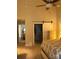 Bedroom featuring neutral paint, vaulted ceiling, fan, and barn door that leads to the bathroom and closet at 111 Pine Grove Cir, Clover, SC 29710