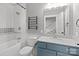 Stylish bathroom with a vanity, a shower with decorative tile, and new fixtures at 1135 Old Charlotte Rd, Concord, NC 28027