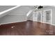 Large bonus room with hardwood floors and ample space for activities at 1135 Old Charlotte Rd, Concord, NC 28027