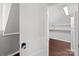Hallway and view to closet space with ample storage shelves and rod at 1135 Old Charlotte Rd, Concord, NC 28027