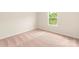 Empty bedroom featuring natural light and soft carpet at 119 Lightning Dr, Shelby, NC 28152