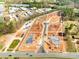 Aerial view of a construction site with individual lots in the foreground, showing clear boundaries at 121 Winners Cir # 2, Mooresville, NC 28117