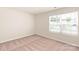 Bedroom with beige carpet and a window at 125 Lightning Dr, Shelby, NC 28152