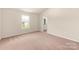 Cozy bedroom with soft carpeting and lots of natural light at 125 Lightning Dr, Shelby, NC 28152