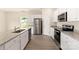 Beautiful kitchen with stainless steel appliances and bright white cabinets at 125 Lightning Dr, Shelby, NC 28152