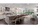 Open-concept kitchen with a large island, pendant lighting, and stainless steel appliances at 13217 Oak Farm Ln, Huntersville, NC 28078