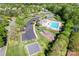The aerial view shows a community pool, playground, basketball court, tennis court, and parking at 1347 Eisenhower Nw Pl, Concord, NC 28027