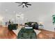 Bright living room features hardwood floors and modern furniture at 1347 Eisenhower Nw Pl, Concord, NC 28027