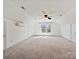 Finished attic space with carpet flooring, dormer window, and neutral paint at 1525 Autumn Brook Ln # 78, York, SC 29745