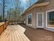 Enjoy outdoor living on this wooden deck with white-framed door and nice view at 1525 Autumn Brook Ln # 78, York, SC 29745