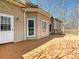 Wooden deck features white door, window, and wood railing at 1525 Autumn Brook Ln # 78, York, SC 29745