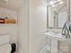 Powder room features a pedestal sink, toilet, and decorative wall accents at 1525 Autumn Brook Ln # 78, York, SC 29745