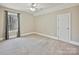 Spacious bedroom with carpet, ceiling fan, and large window at 1525 Autumn Brook Ln # 78, York, SC 29745