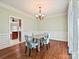 Formal dining room features hardwood flooring, modern lighting, and decorative trim at 1525 Autumn Brook Ln # 78, York, SC 29745