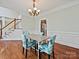Traditional dining space with hardwood floors, elegant lighting, and adjacent kitchen at 1525 Autumn Brook Ln # 78, York, SC 29745