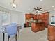 A spacious kitchen features wood cabinets, granite countertops, stainless steel appliances, and a functional island at 1525 Autumn Brook Ln # 78, Clover, SC 29745