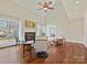 Inviting living room features a cozy fireplace, hardwood floors, and high ceilings at 1525 Autumn Brook Ln # 78, York, SC 29745