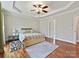 Spacious main bedroom with hardwood floors, tray ceiling, and a ceiling fan at 1525 Autumn Brook Ln # 78, York, SC 29745