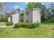 Exterior view of a two-story apartment building with mature trees and landscaping at 1606 Eagles Pl # J101, Rock Hill, SC 29732