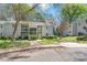 Inviting two-story exterior with a charming balcony and well-maintained landscaping at 1606 Eagles Pl # J101, Rock Hill, SC 29732