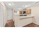 Well-organized kitchen with a pass through, offering both functionality and style at 1606 Eagles Pl # J101, Rock Hill, SC 29732