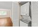 Laundry area with stacked washer and dryer unit, and additional storage space at 1606 Eagles Pl # J101, Rock Hill, SC 29732