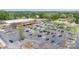 An aerial view of a shopping center with plenty of parking and a variety of retail stores at 16308 Poplar Tent Rd, Huntersville, NC 28078