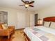 Well-lit bedroom features a ceiling fan, and an earthy rug creating a relaxing and inviting space at 17109 Cabarrus Rd, Midland, NC 28107