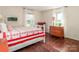 Cozy bedroom with hardwood floors, a comfortable bed, and a view of the outdoors at 17109 Cabarrus Rd, Midland, NC 28107