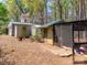 Exterior featuring chicken coops and various sheds at 17109 Cabarrus Rd, Midland, NC 28107