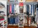 Walk-in closet with custom shelving and hanging rods offers ample storage and organization space at 17109 Cabarrus Rd, Midland, NC 28107