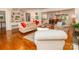 Bright living room with hardwood floors, stylish furniture, and open layout to dining area at 17109 Cabarrus Rd, Midland, NC 28107