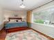 Comfortable bedroom with a large window offering a view of the outdoors at 17109 Cabarrus Rd, Midland, NC 28107