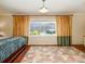 Bedroom with a large window overlooking the outside, with a comfortable bed at 17109 Cabarrus Rd, Midland, NC 28107