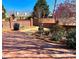 Charming backyard featuring a brick patio and mature landscaping at 1921 Wexford Ct, Gastonia, NC 28054