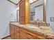 Bathroom with double sinks, granite counters, and tiled backsplash at 1921 Wexford Ct, Gastonia, NC 28054