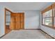 Cozy bedroom featuring neutral walls and a large window with a view at 1921 Wexford Ct, Gastonia, NC 28054