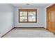 Well-lit bedroom with a large window offering neighborhood views at 1921 Wexford Ct, Gastonia, NC 28054