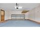 Clean and spacious garage featuring painted walls and shelving at 1921 Wexford Ct, Gastonia, NC 28054