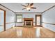 Spacious living room boasts a brick fireplace, hardwood floors, and natural light at 1921 Wexford Ct, Gastonia, NC 28054