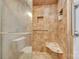 Tile shower with seating and glass doors at 1921 Wexford Ct, Gastonia, NC 28054
