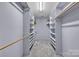 This expansive walk-in closet boasts built-in shelving and ample storage space at 1921 Wexford Ct, Gastonia, NC 28054