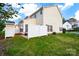 A fenced backyard with a small patio and green grass at 1965 Charlotte Hwy # 401, Mooresville, NC 28115