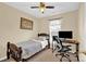 Bedroom featuring a desk, a chair, and a bed with decorative pillows at 1965 Charlotte Hwy # 401, Mooresville, NC 28115